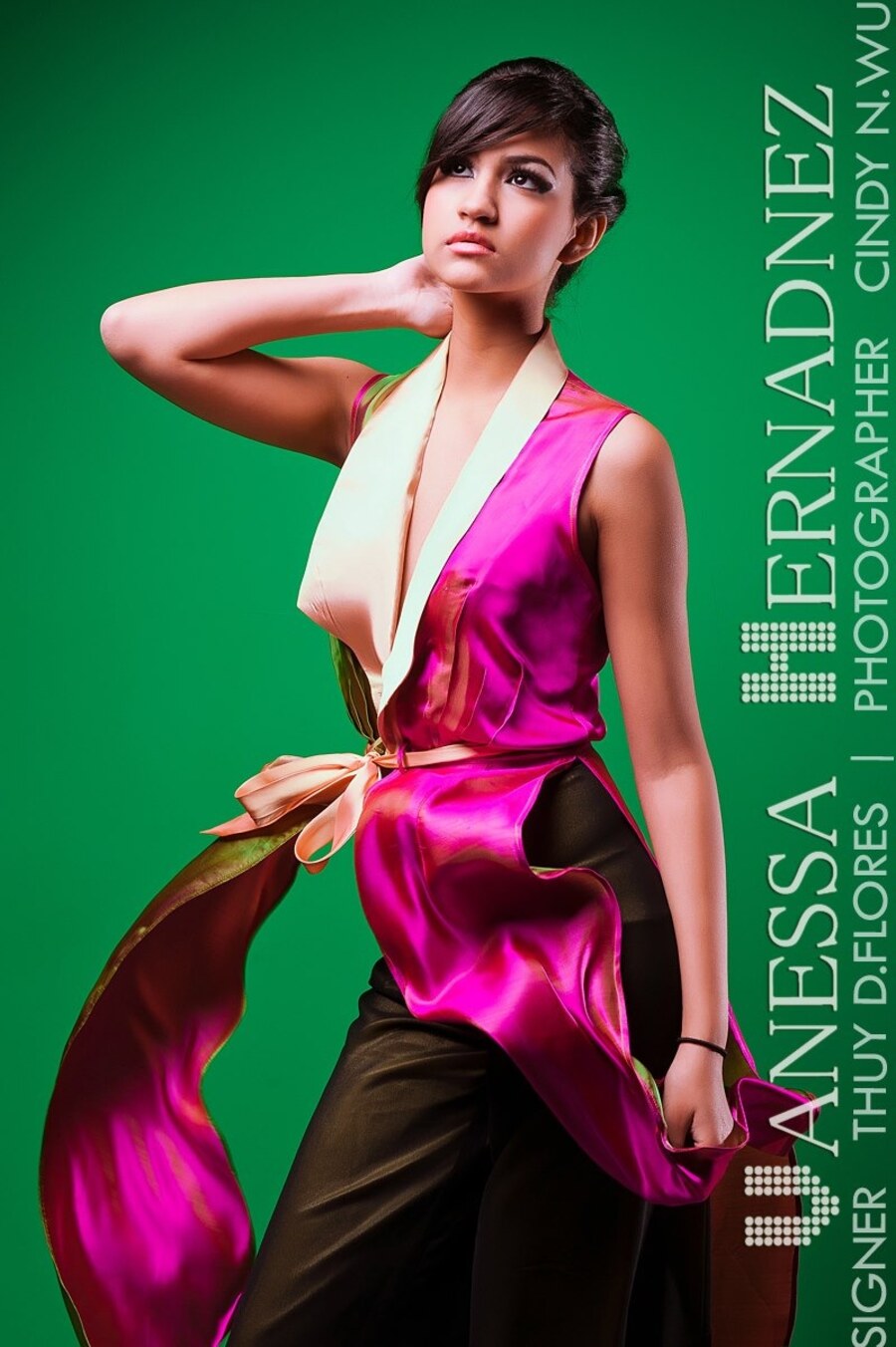 Magenta and green silk wrap top with sash on green backdrop